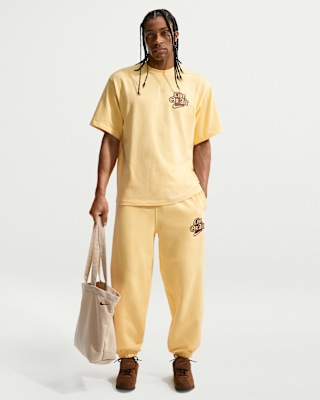 Nike Solo Swoosh Men's Cuffed Fleece Trousers. Nike PT